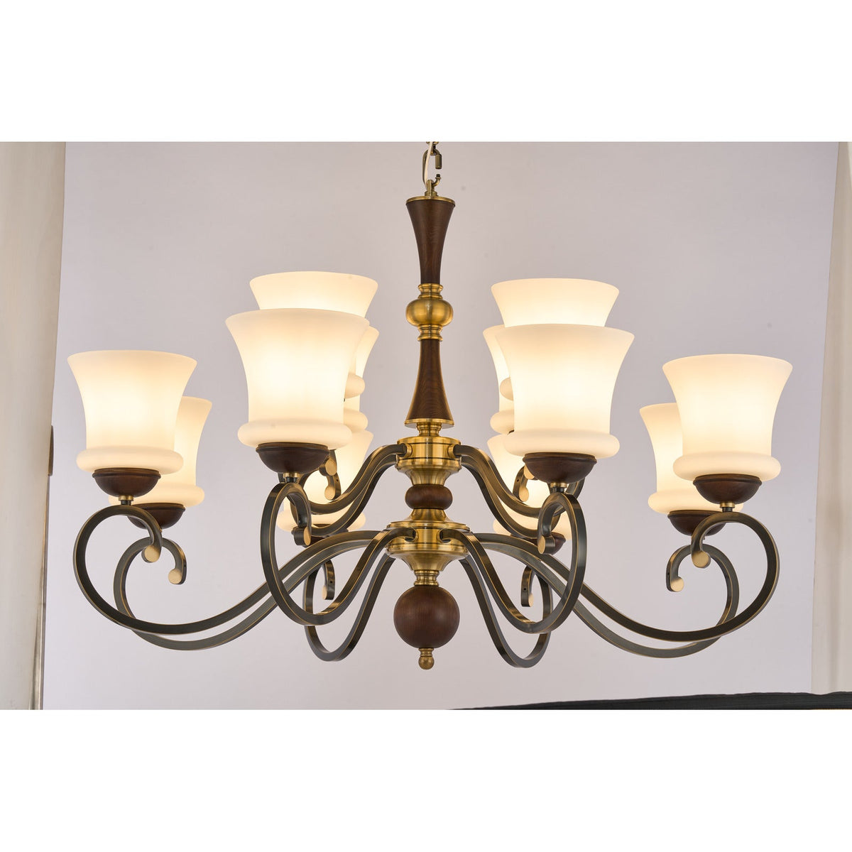 
Supplier real photograph of the Langford twelve-light two-tier chandelier complete lit front view